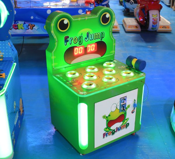 A colorful coin-operated Single-Player Frog Whack-a-Mole Game designed for kids. The machine features a charming frog theme, vibrant graphics, and interactive whack-a-mole gameplay. Ideal for arcades, family entertainment centers, and playrooms, it offers a fun and engaging experience for young players.