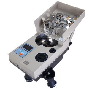 A high-speed coin counting machine efficiently sorting and counting coins.