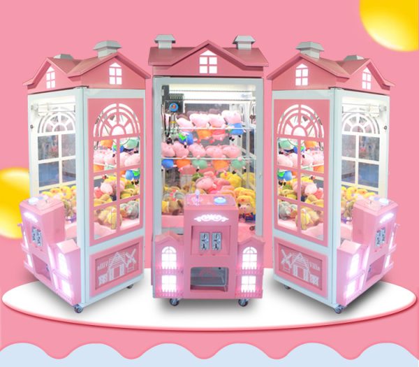 Phone booth style claw machine with colorful stuffed toys inside, attracting players with its vintage design