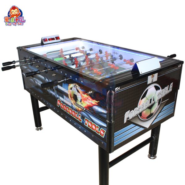 Coin-operated table football machine for kids and adults, perfect for arcades and entertainment venues.