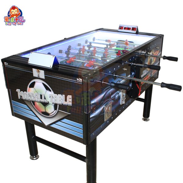 Coin-operated table football machine for kids and adults, perfect for arcades and entertainment venues.