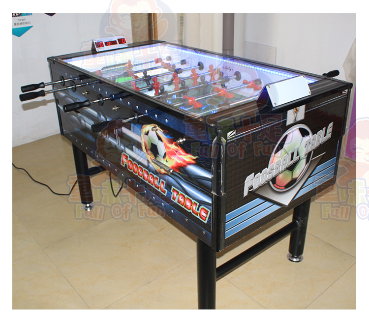 Coin-operated table football machine for kids and adults, perfect for arcades and entertainment venues.