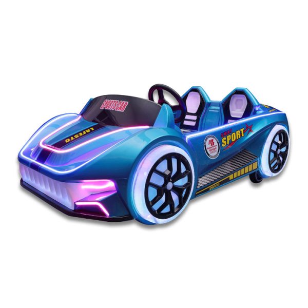 A colorful racing car kiddie ride designed for children, featuring bright colors and a sleek design, located in a playground setting.