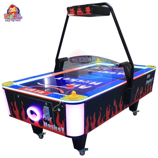 Coin-operated two-player flame air hockey table with LED lighting.