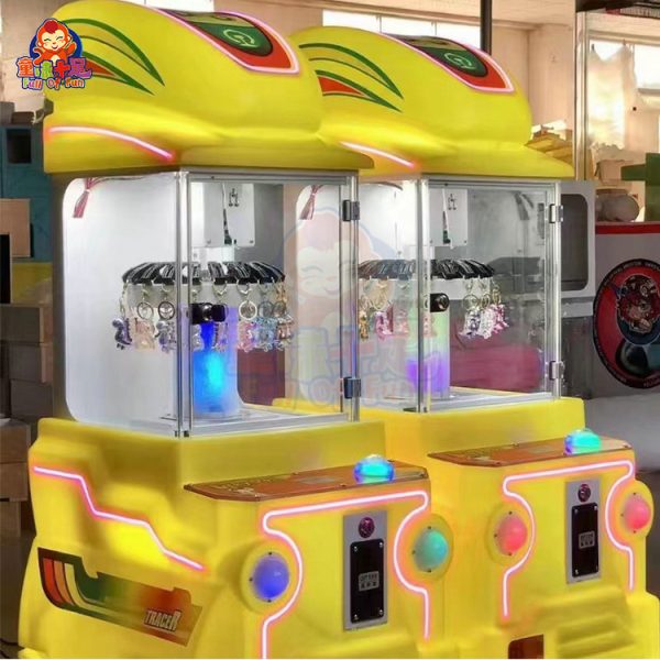 MINI clamp machine with colorful design, easy-to-use joystick, and toy prizes for arcade and entertainment use.