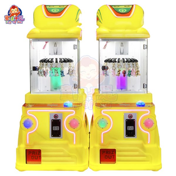 MINI clamp machine with colorful design, easy-to-use joystick, and toy prizes for arcade and entertainment use.